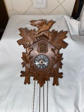 Traditional river city German Cuckoo Clock with Hand-Carved Maple Leaves